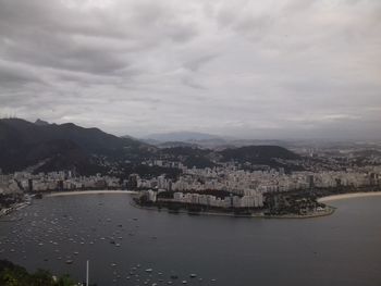 High angle view of city by sea