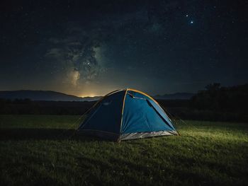 Tent against sky at night