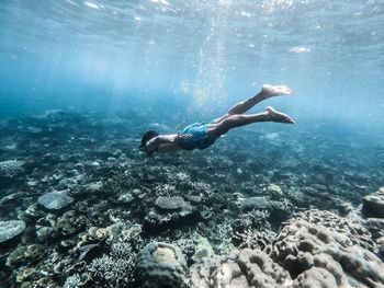 Man swimming in sea