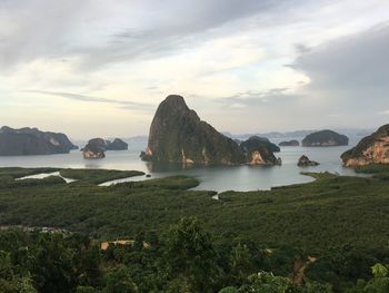 Scenic view of bay against sky