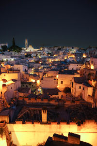 High angle view of illuminated cityscape at night