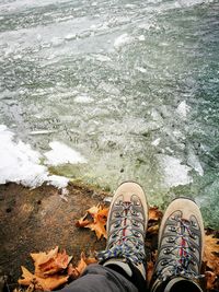 Low section of man legs on water