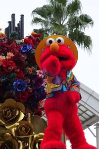 Close-up of multi colored toy against trees