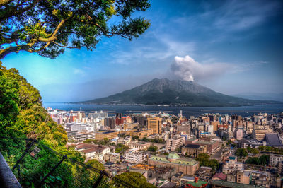 Kagoshima city view with erupting sakurajima volcano