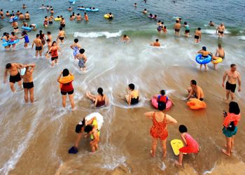 High angle view of people in sea