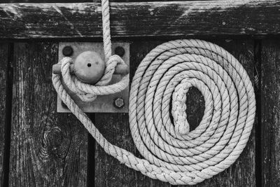 Close-up of rope tied on jetty