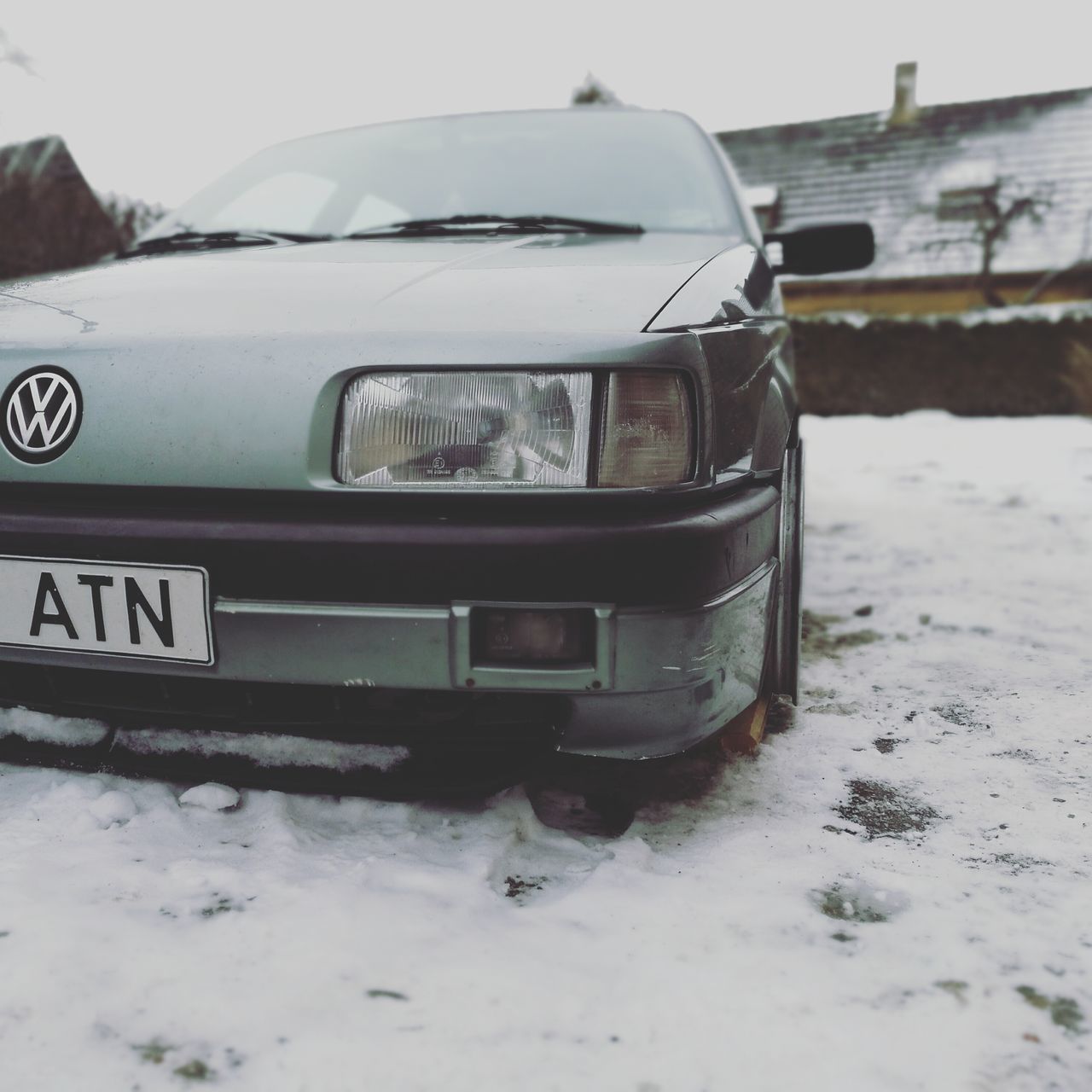 CLOSE-UP OF SNOW ON CAR