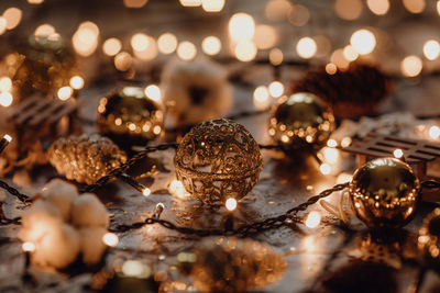 Close-up of christmas lights on table