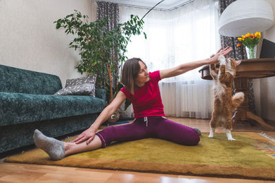 Full length of woman at home