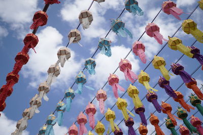 Low angle view of decoration hanging against sky