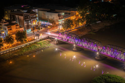 High angle view of illuminated city at night