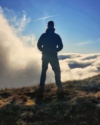 Low angle view of man standing on field