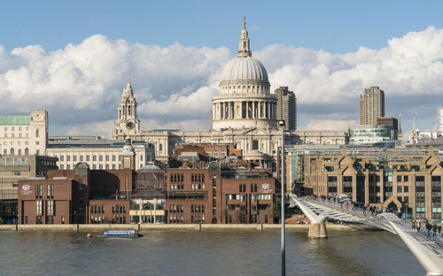 View of buildings against cloudy sky