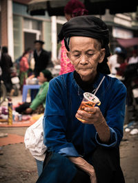 Portrait of man holding ice cream