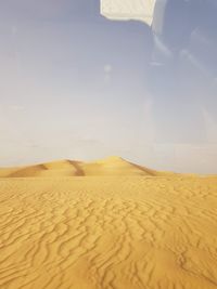 Scenic view of desert against sky