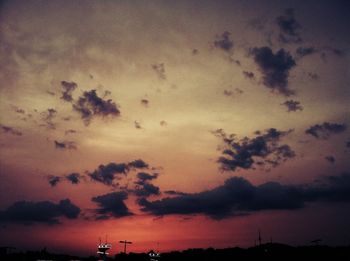 Low angle view of cloudy sky at sunset