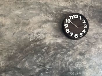 Close-up of clock on wall