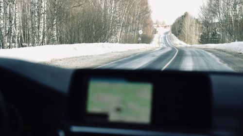 Road seen through car windshield