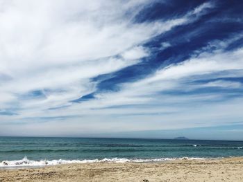 Scenic view of beach against sky