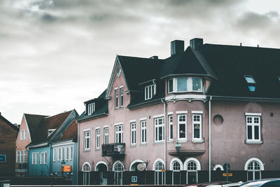 Low angle view of houses against sky