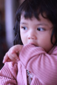 Portrait of cute girl at home
