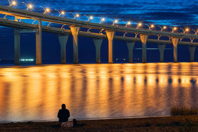 Bridge over sea against sky