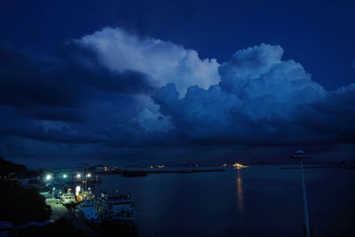 Scenic view of sea against sky at night