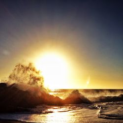 Scenic view of sea at sunset