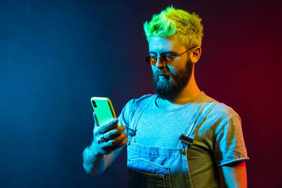 Young man using smart phone