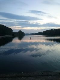 Scenic view of calm lake against sky