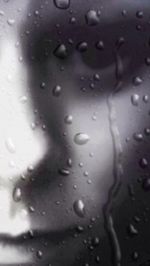 Close-up of water drops on glass