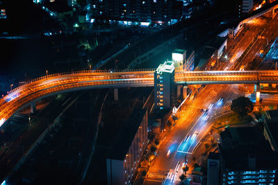 Aerial view of light trails on road at night