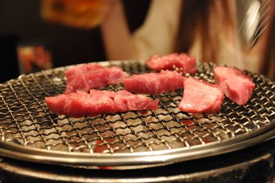 Close-up of meat on barbecue grill