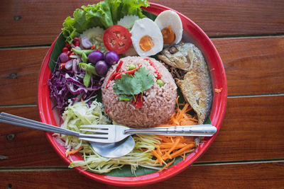 High angle view of fruits in plate on table