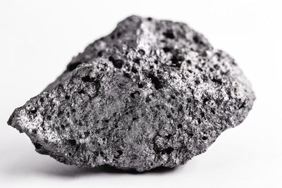 Close-up of rocks against white background