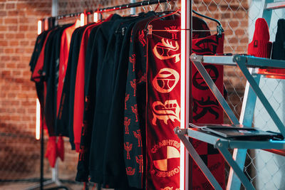 Close-up of clothes hanging on display at store