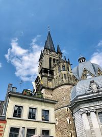 Low angle view of historic building against sky aachen cathedral