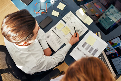 High angle view of people working at office