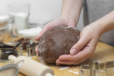 Midsection of man preparing food in kitchen