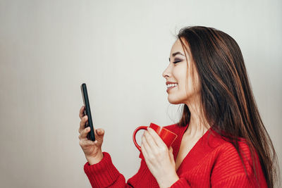 Young woman using mobile phone