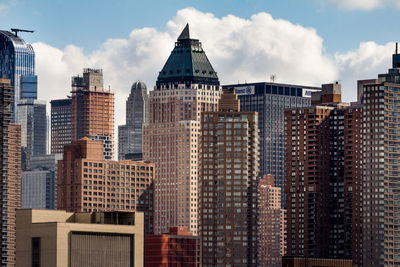 Modern cityscape against sky