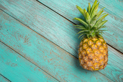 Close-up of fruit on wood