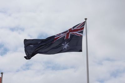 Low angle view of aussie flag against sky