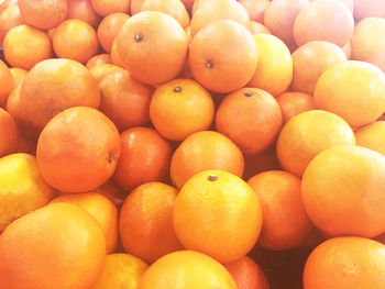 Full frame shot of oranges in market