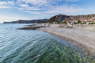 Winter sunset over the bay of portopiccolo sistiana. duino. italy