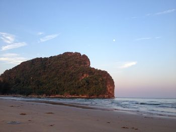 Scenic view of beach and sea against sky