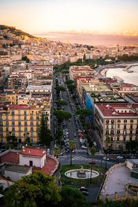 High angle view of townscape against sky during sunset