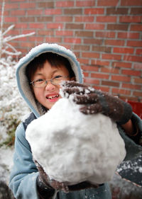 Portrait of smiling girl in snow