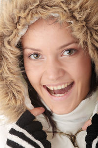 Close-up portrait of a smiling young woman