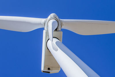 Wind turbine in colorado against blue sky